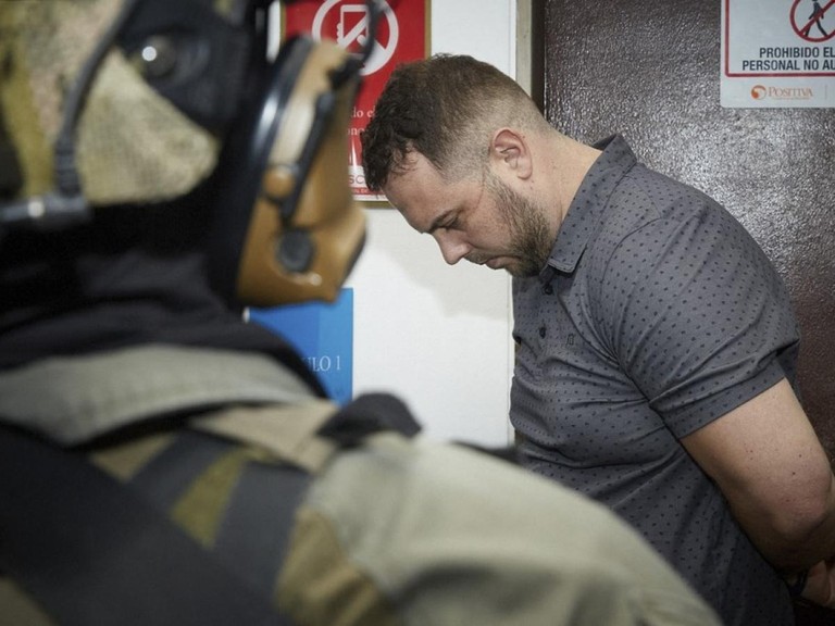 Se aplaza audiencia contra John Poulos