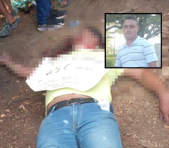 Lo asesinaron y le dejaron un letrero