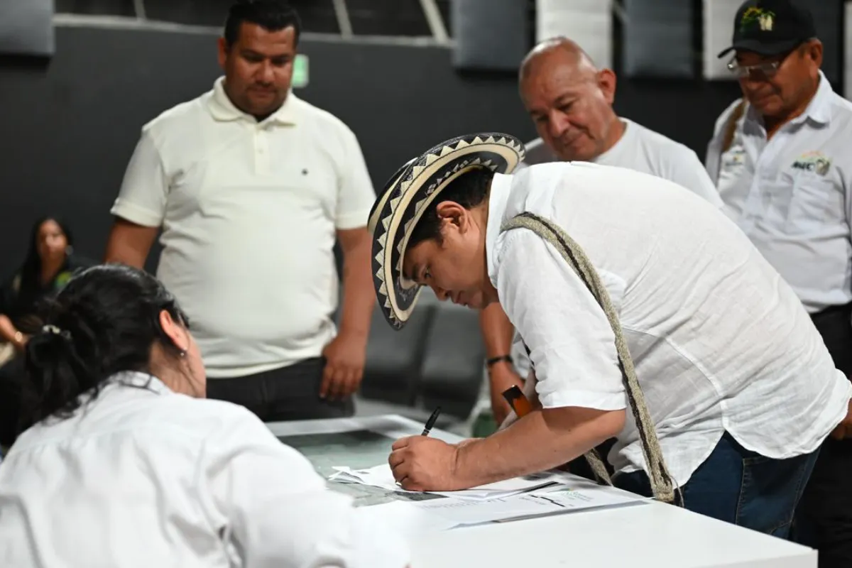 Acuerdos entre campesinos e indígenas para la distribución del territorio de la finca Simba